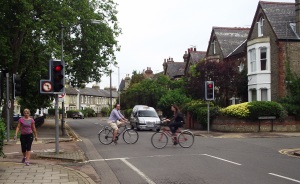 Traffic calming at work at the St Barnabas Street junction. Red signals slow motor traffic.